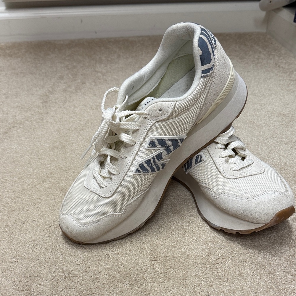 New Balance White and Blue Sneakers